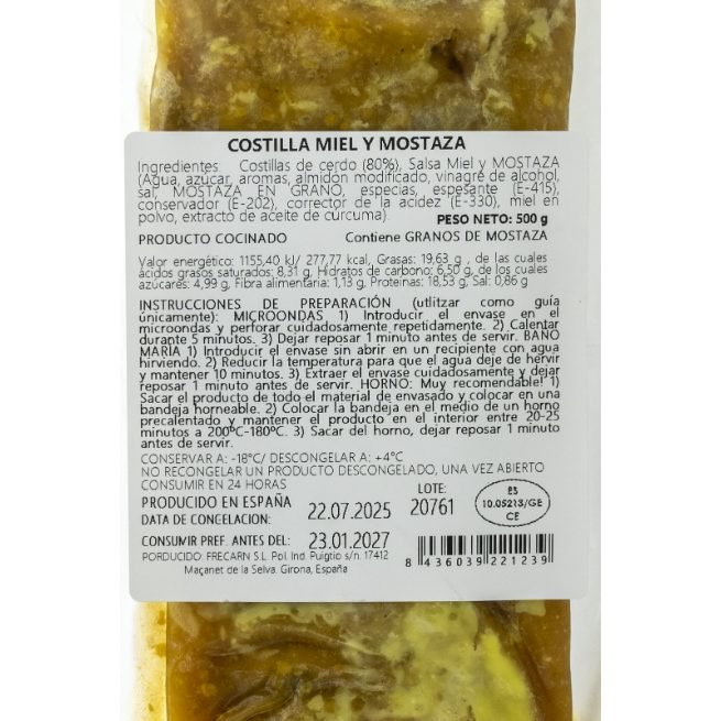 Costillas de cerdo cocinadas con salsa de miel y mostaza Costillas de cerdo cocinadas con salsa de miel y mostaza
